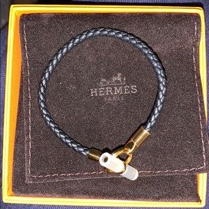 Hermès Glenan black and gold leather bracelet
